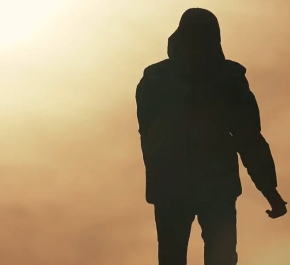 Silhuetten av en ung gutt. - Klikk for stort bilde